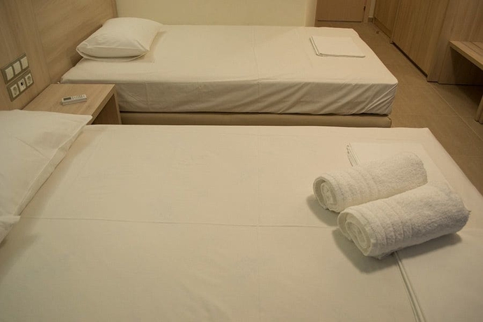 Imagen de la habitación del Hotel Alarzo Rooms. Foto 14