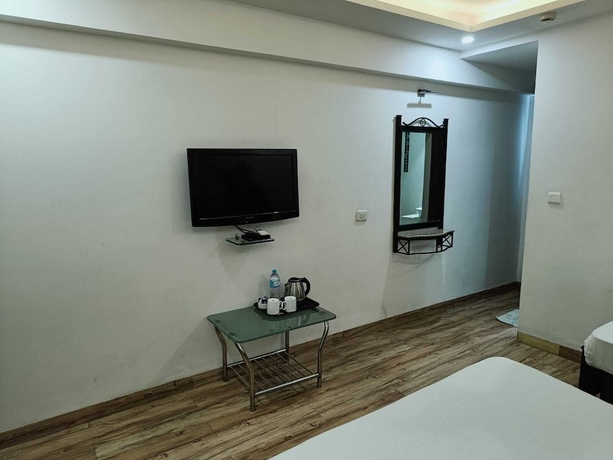 Imagen de la habitación del Hotel Alba Premier Indore. Foto 4