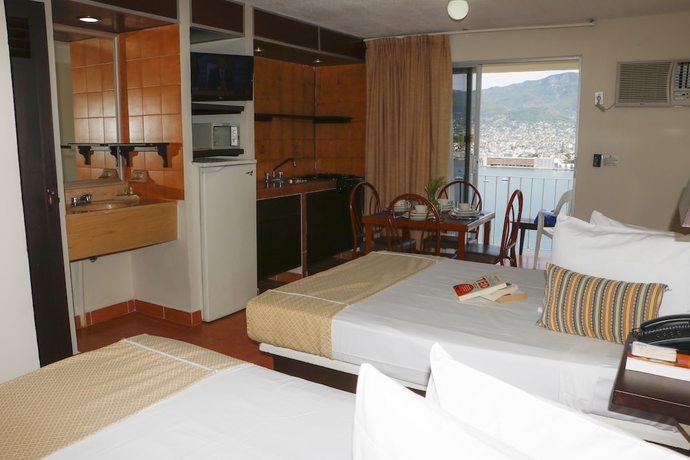 Imagen de la habitación del Hotel Alba Suites Acapulco. Foto 11