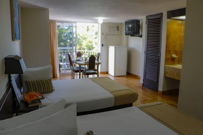Imagen de la habitación del Hotel Alba Suites Acapulco. Foto 12