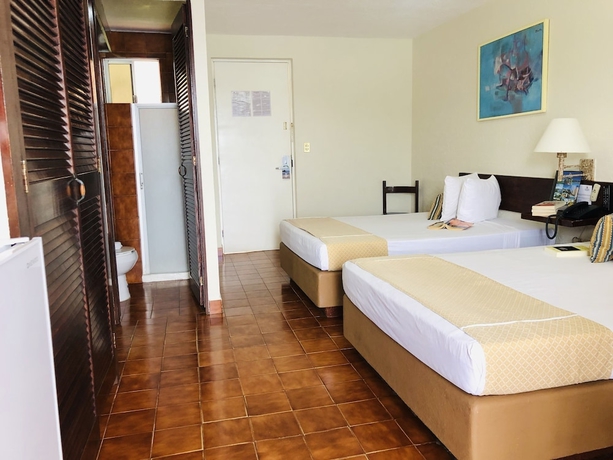 Imagen de la habitación del Hotel Alba Suites Acapulco. Foto 13