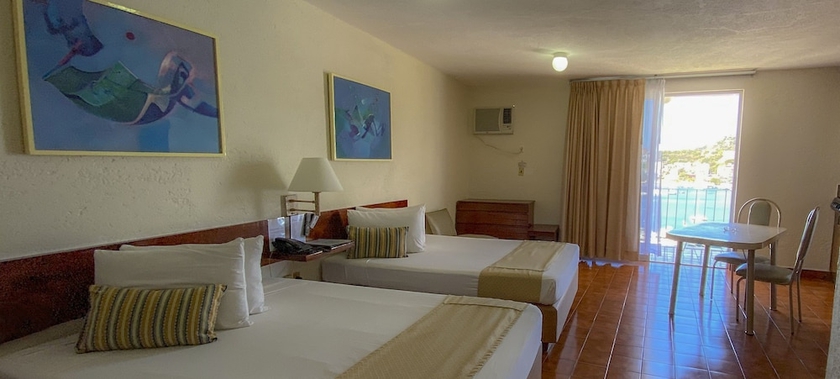 Imagen de la habitación del Hotel Alba Suites Acapulco. Foto 15