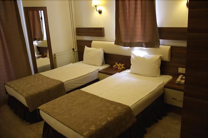 Imagen de la habitación del Hotel Albano, Cesme. Foto 6