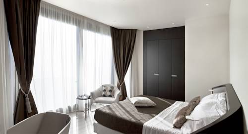 Imagen de la habitación del Hotel Albarella Golf. Foto 12