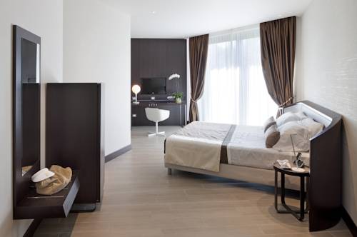 Imagen de la habitación del Hotel Albarella Golf. Foto 13