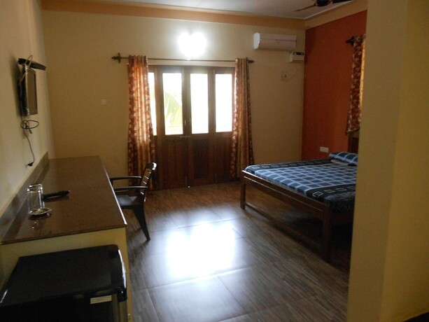 Imagen de la habitación del Hotel Albenjoh Guesthouse. Foto 15