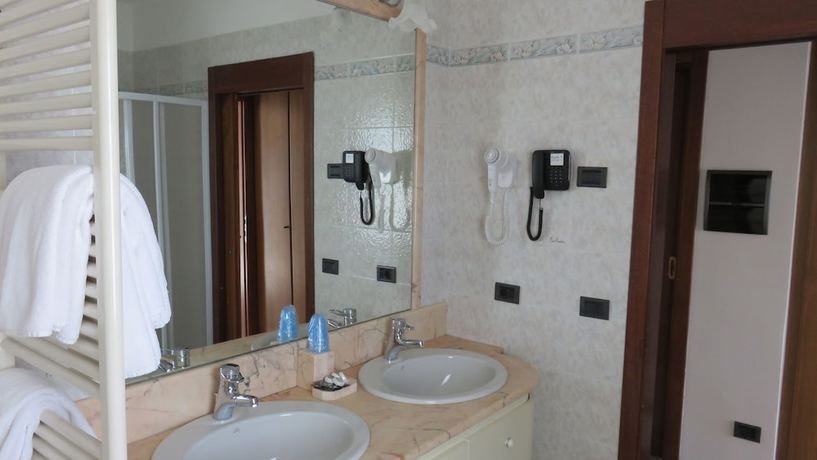 Imagen de la habitación del Hotel Albergo Al Cacciatore. Foto 5