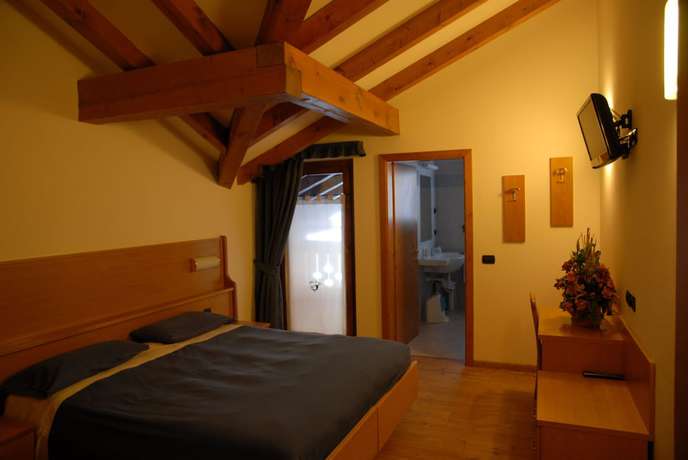 Imagen de la habitación del Hotel Albergo Alla Posta, Sant'Antonio di Mavignola. Foto 9