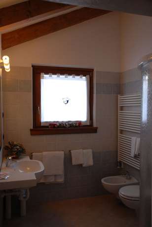 Imagen de la habitación del Hotel Albergo Alla Posta, Sant'Antonio di Mavignola. Foto 10