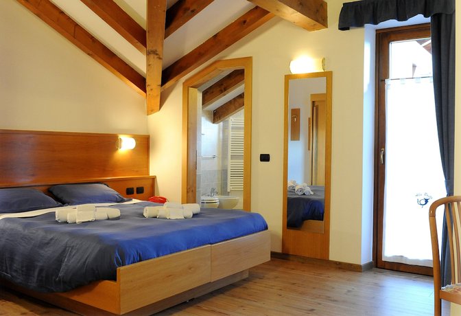 Imagen de la habitación del Hotel Albergo Alla Posta, Sant'Antonio di Mavignola. Foto 12