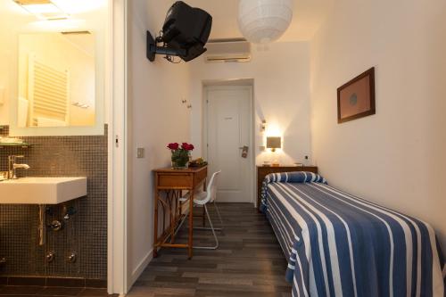 Imagen de la habitación del Hotel Albergo Alla Spiaggia. Foto 6