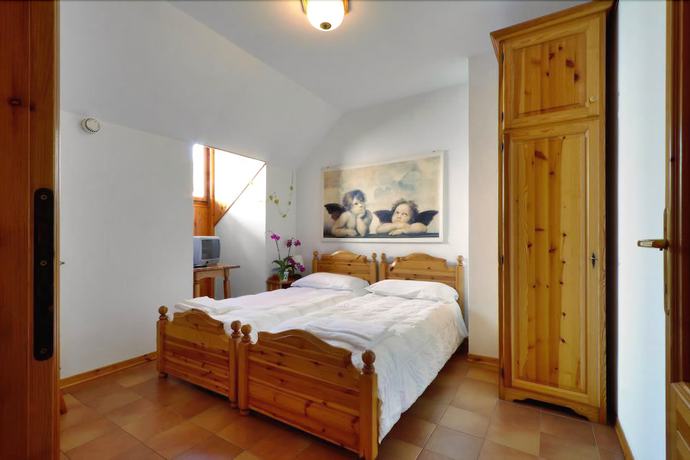Imagen de la habitación del Hotel Albergo Alle Alpi. Foto 9