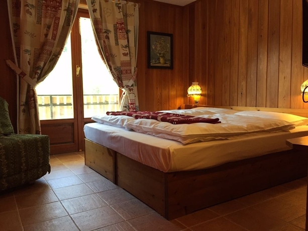 Imagen de la habitación del Hotel Albergo Alpenrose Skiandbike Mountain. Foto 5