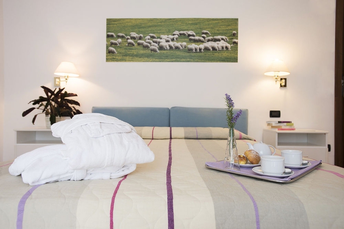 Imagen de la habitación del Hotel Albergo Angiolino. Foto 13