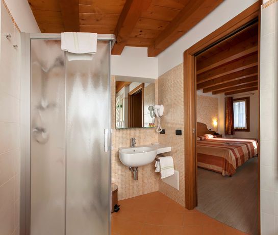 Imagen de la habitación del Hotel Albergo Antica Corte Marchesini. Foto 14