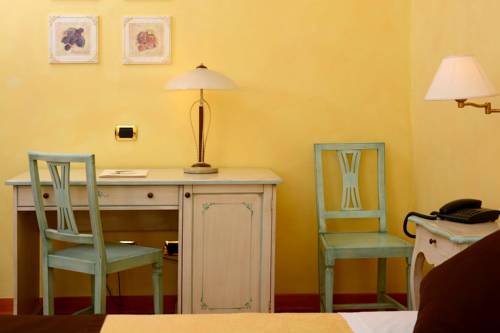 Imagen de la habitación del Hotel Albergo Antica Hostelleria. Foto 7