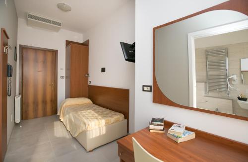 Imagen de la habitación del Hotel Albergo Arcobaleno. Foto 6