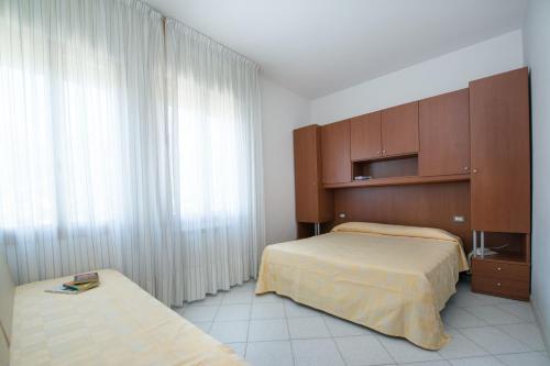 Imagen de la habitación del Hotel Albergo Arcobaleno. Foto 9