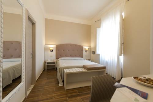 Imagen de la habitación del Hotel Albergo Battelli. Foto 6