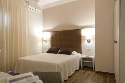 Imagen de la habitación del Hotel Albergo Battelli. Foto 14