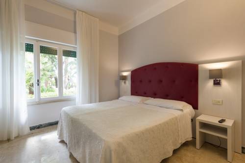 Imagen de la habitación del Hotel Albergo Battelli. Foto 16
