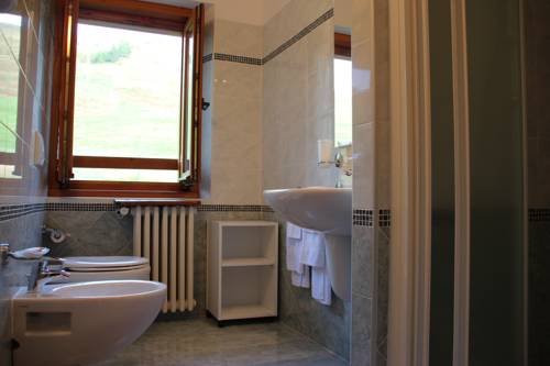 Imagen de la habitación del Hotel Albergo Bucaneve. Foto 9