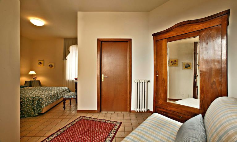 Imagen de la habitación del Hotel Albergo Cannon D\'Oro. Foto 13