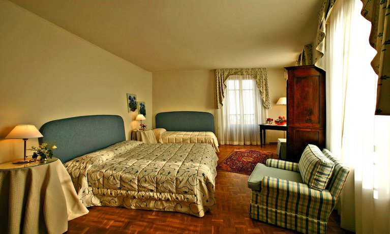 Imagen de la habitación del Hotel Albergo Cannon D\'Oro. Foto 14