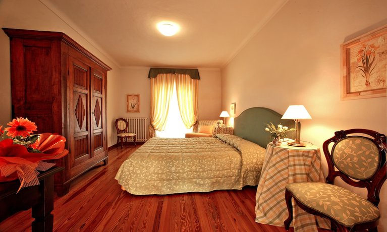 Imagen de la habitación del Hotel Albergo Cannon D\'Oro. Foto 16