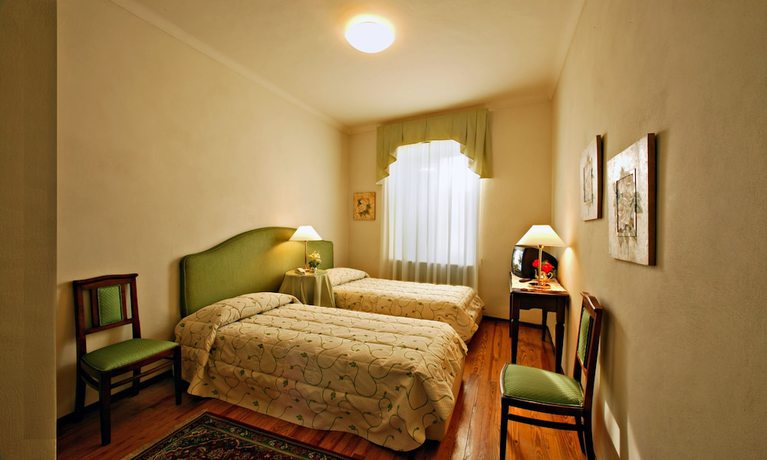 Imagen de la habitación del Hotel Albergo Cannon D\'Oro. Foto 17