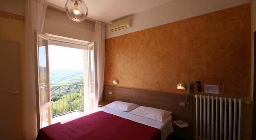 Imagen de la habitación del Hotel Albergo Centopini. Foto 9