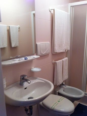 Imagen de la habitación del Hotel Albergo Centrale, Fino del Monte. Foto 18