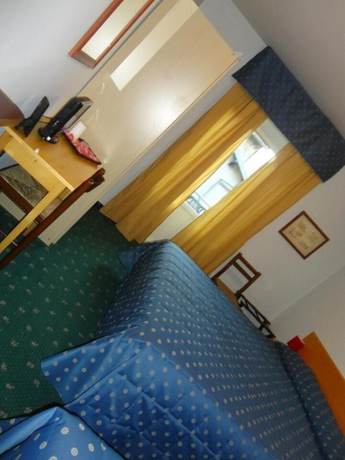 Imagen de la habitación del Hotel Albergo Centrale, Fino del Monte. Foto 19