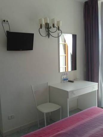 Imagen de la habitación del Hotel Albergo Dei 10 Colori. Foto 4