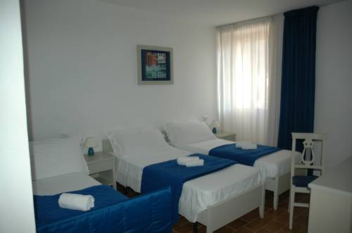 Imagen de la habitación del Hotel Albergo Dei 10 Colori. Foto 5