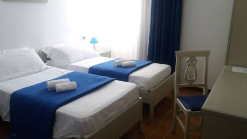 Imagen de la habitación del Hotel Albergo Dei 10 Colori. Foto 6
