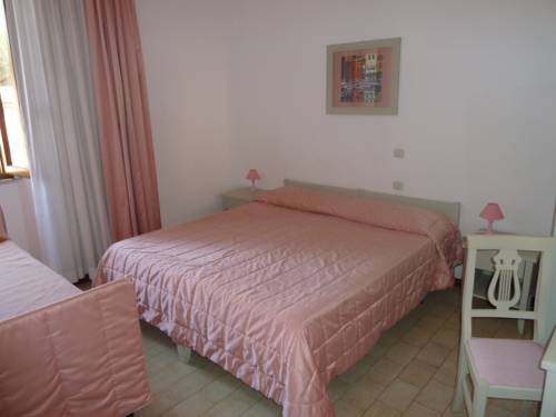 Imagen de la habitación del Hotel Albergo Dei 10 Colori. Foto 9