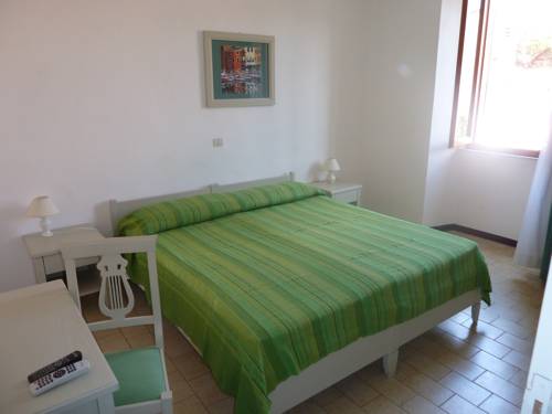 Imagen de la habitación del Hotel Albergo Dei 10 Colori. Foto 11