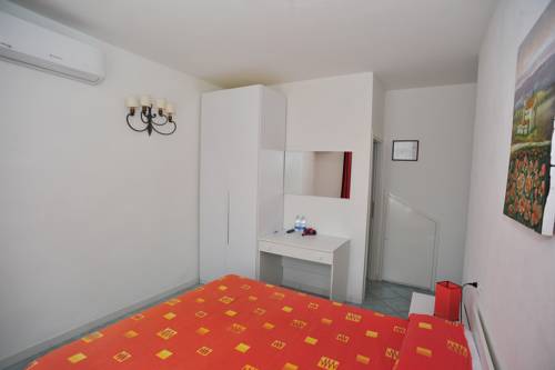 Imagen de la habitación del Hotel Albergo Dei 10 Colori. Foto 15
