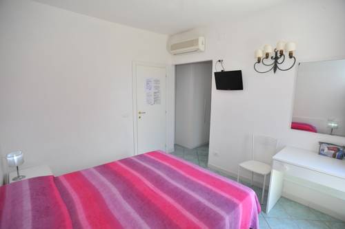 Imagen de la habitación del Hotel Albergo Dei 10 Colori. Foto 16