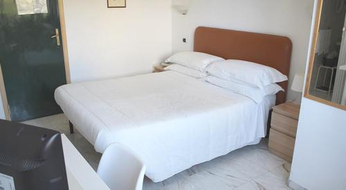 Imagen de la habitación del Hotel Albergo Dei Pini. Foto 19