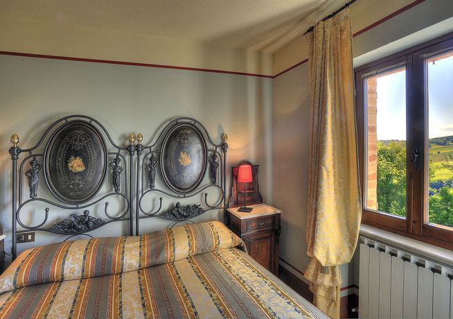 Imagen de la habitación del Hotel Albergo Diffuso Borgo Montemaggiore. Foto 6