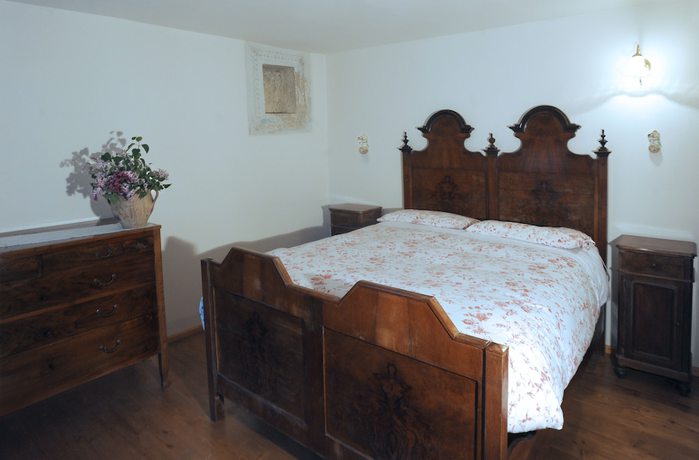 Imagen de la habitación del Hotel Albergo Diffuso Comeglians. Foto 3