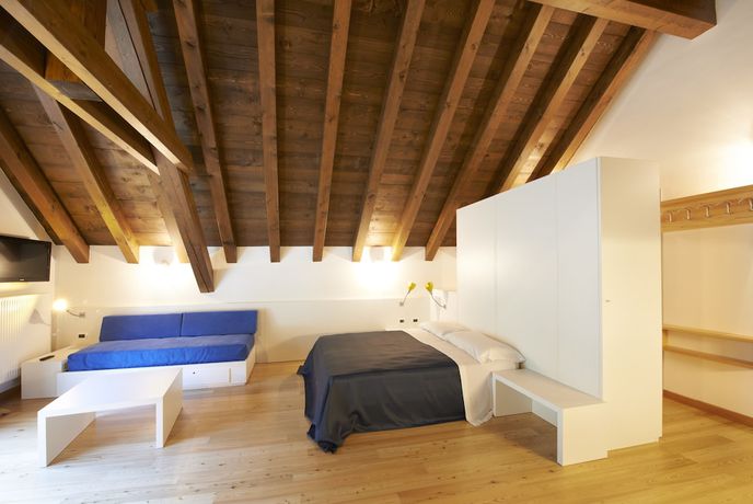 Imagen de la habitación del Hotel Albergo Diffuso Comeglians. Foto 13