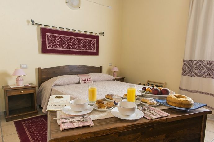 Imagen de la habitación del Hotel Albergo Diffuso Il Mandorlo. Foto 10