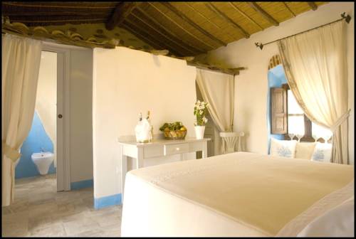 Imagen de la habitación del Hotel Albergo Diffuso Mannois. Foto 7