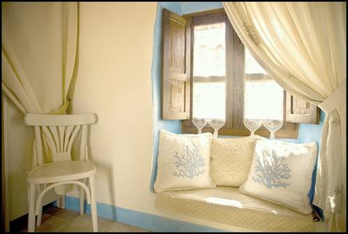 Imagen de la habitación del Hotel Albergo Diffuso Mannois. Foto 8