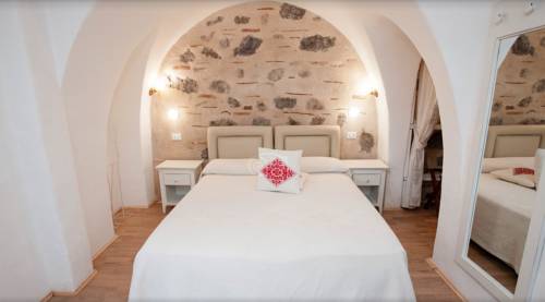 Imagen de la habitación del Hotel Albergo Diffuso Mannois. Foto 10
