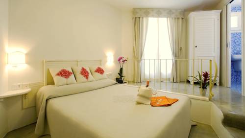 Imagen de la habitación del Hotel Albergo Diffuso Mannois. Foto 13