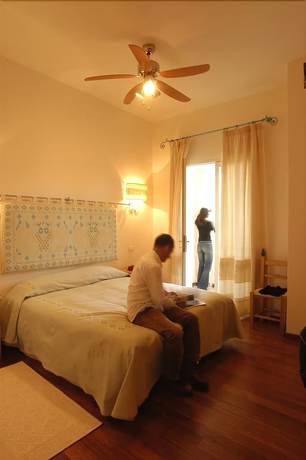 Imagen de la habitación del Hotel Albergo Diffuso Omu Axiu. Foto 9